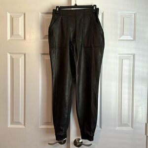 NWT SPANX size small black faux leather joggers. Front pockets. Never worn.